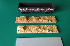 de l'avant vers l'arrière : lest, chargement en cours d'élaboration, chargement en résine d'origine, tombereau SFCC de l'avant vers l'arrière : lest, chargement en cours d'élaboration, chargement en résine d'origine, tombereau SFCC