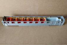 découpe de l'aménagement intérieur d'origine, insertion de l'élément figurant la partie fourgon, et décoration découpe de l'aménagement intérieur d'origine, insertion de l'élément figurant la partie fourgon, et décoration