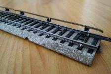 élément de voie avec rail latéral élément de voie avec rail latéral