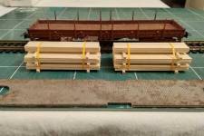 d'avant en arrière : lest à découper, chargement Duha, wagon Apocopa d'avant en arrière : lest à découper, chargement Duha, wagon Apocopa